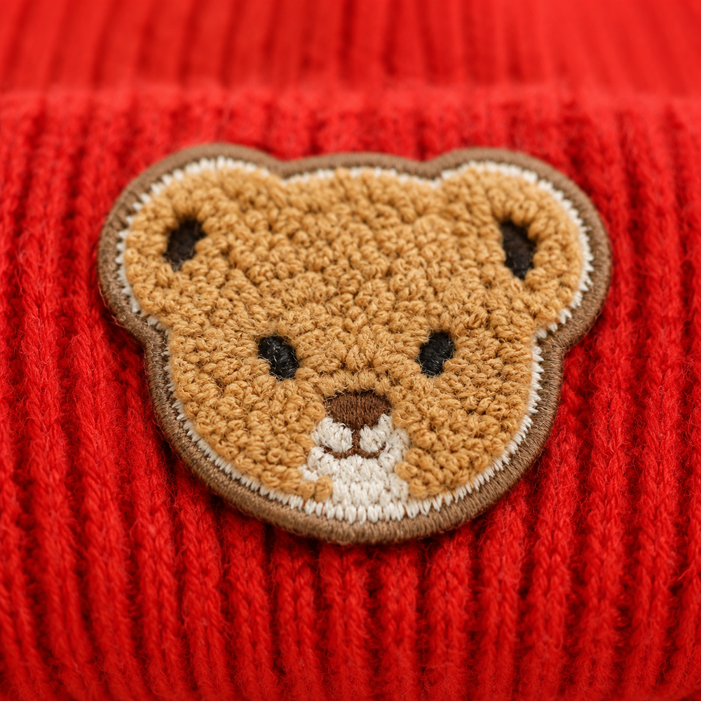 Sterling™ Child Winter Knit Bonnet with Double Pom Poms