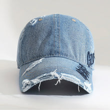 Sterling Distressed Denim Cap™ With “Never Give Up” Stitching