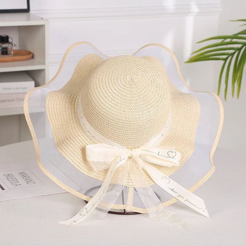 Sterling Straw Hat with Poppy Ribbon™ Wide Brim Woven Bow Detail