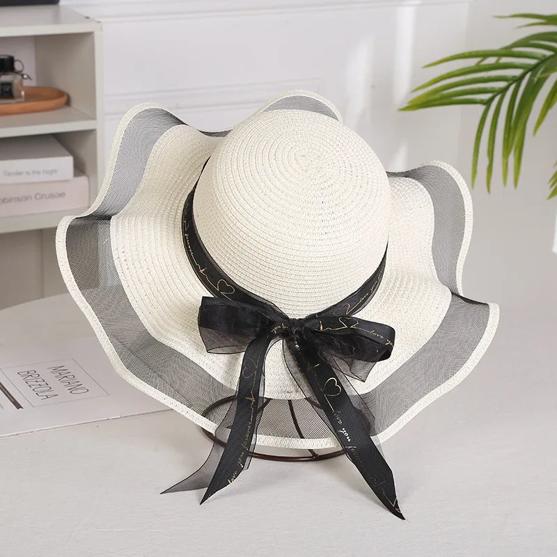 Sterling Straw Hat with Poppy Ribbon™ Wide Brim Woven Bow Detail