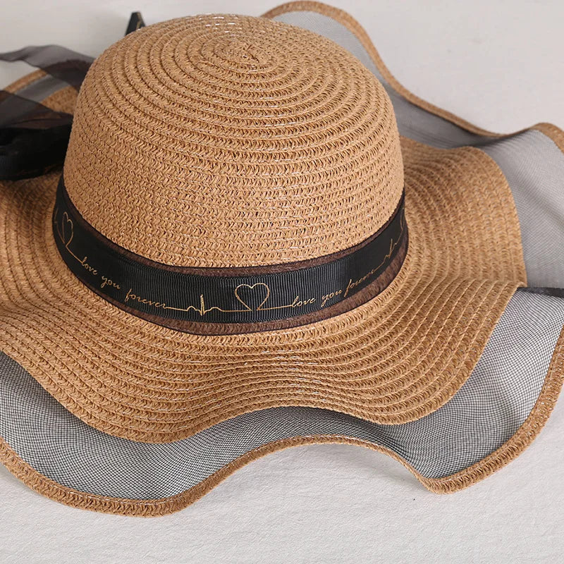 Sterling Straw Hat with Poppy Ribbon™ Wide Brim Woven Bow Detail