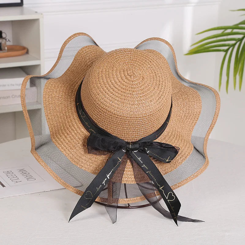 Sterling Straw Hat with Poppy Ribbon™ Wide Brim Woven Bow Detail