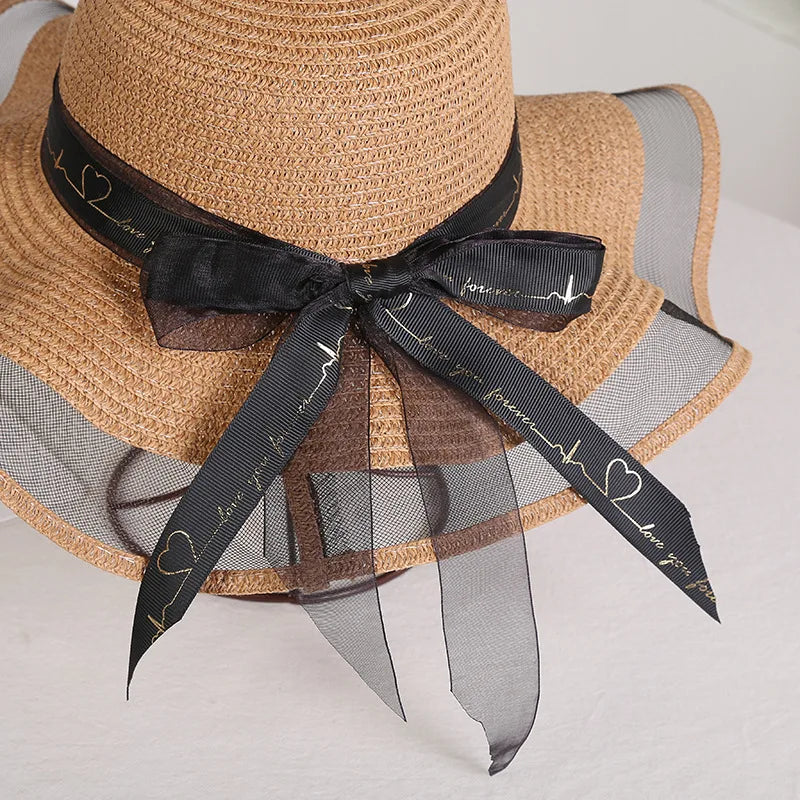 Sterling Straw Hat with Poppy Ribbon™ Wide Brim Woven Bow Detail