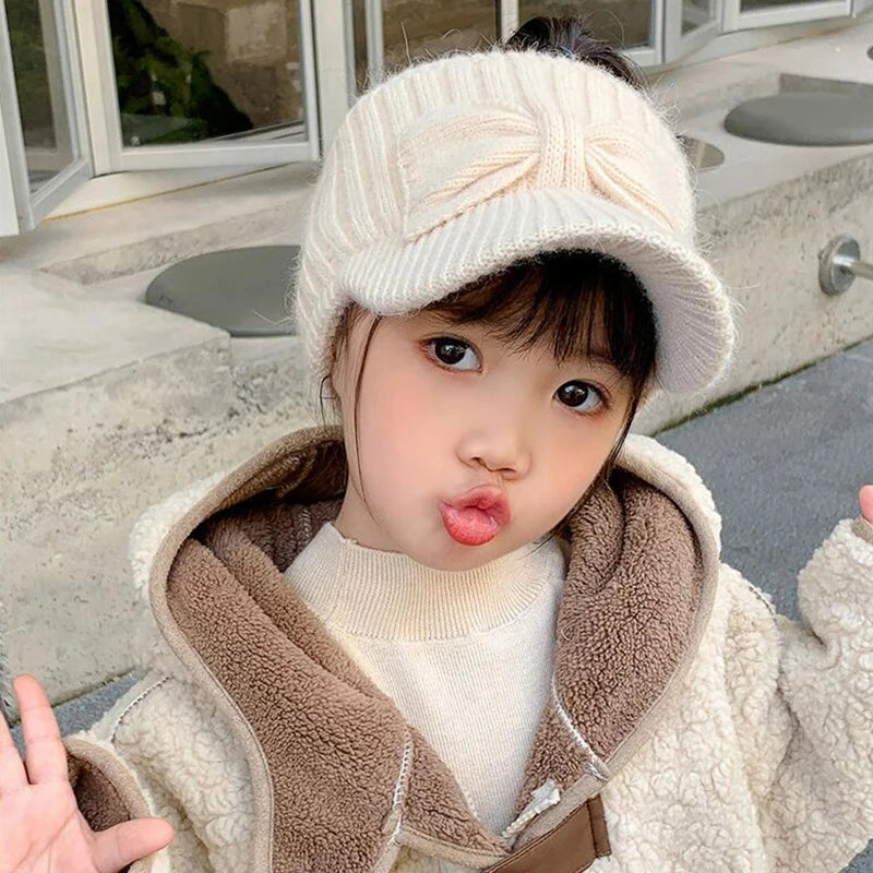 Liora Kids Earflap Cap™ Acrylic Knit Bow Detail
