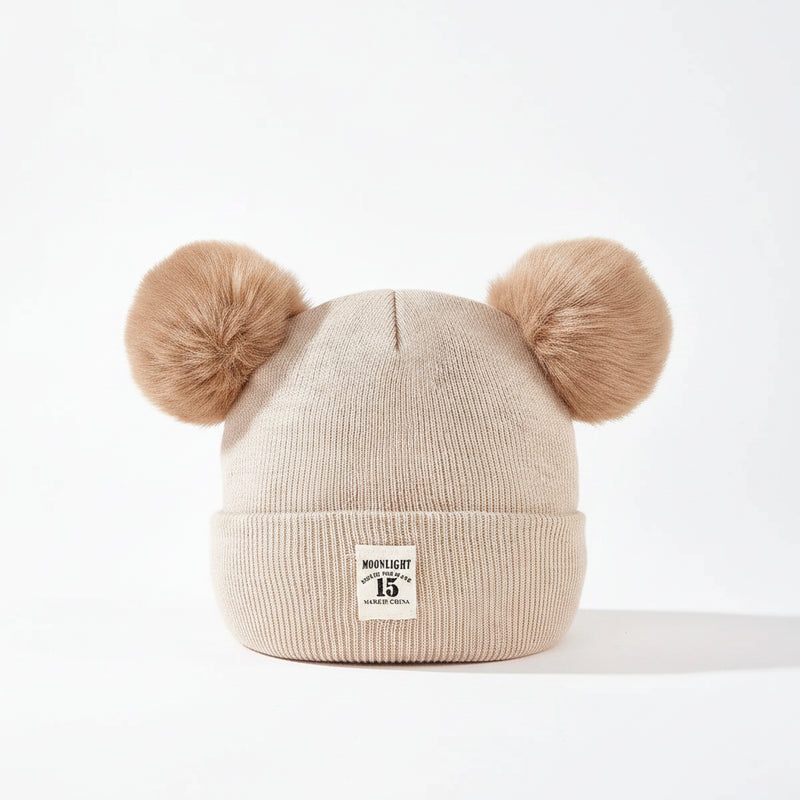 Sterling TeddyPuff Baby Knit Beanie™ Double Pom Bear Detail