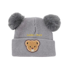 Sterling™ Child Winter Knit Bonnet with Double Pom Poms