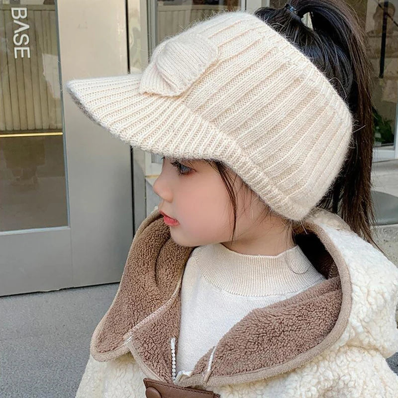 Liora Kids Earflap Cap™ Acrylic Knit Bow Detail