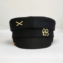 Sterling Newsboy Cap™ Wool Fabric Metal Letter Accent