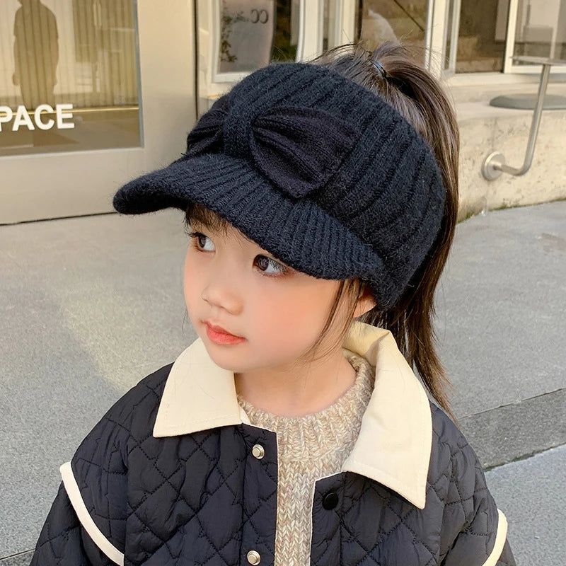 Liora Kids Earflap Cap™ Acrylic Knit Bow Detail