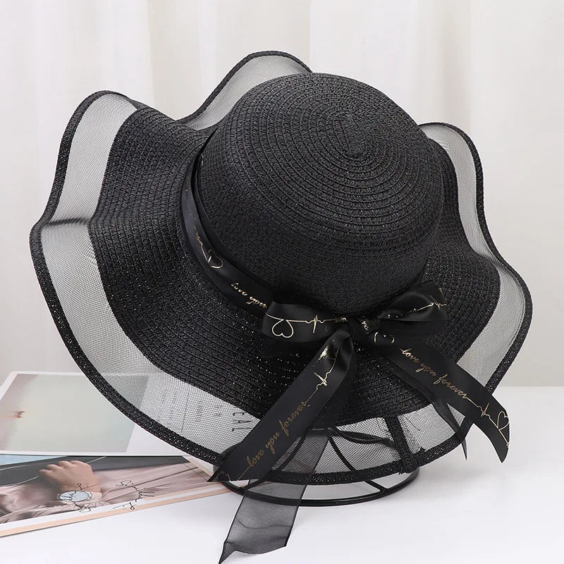 Sterling Straw Hat with Poppy Ribbon™ Wide Brim Woven Bow Detail