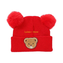 Sterling™ Child Winter Knit Bonnet with Double Pom Poms
